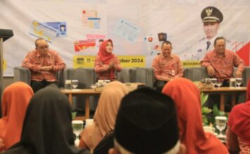 Rapat Koordinasi dan Sosialisasi bertajuk 'Inovasi Pelayanan Dokumen Kependudukan'.